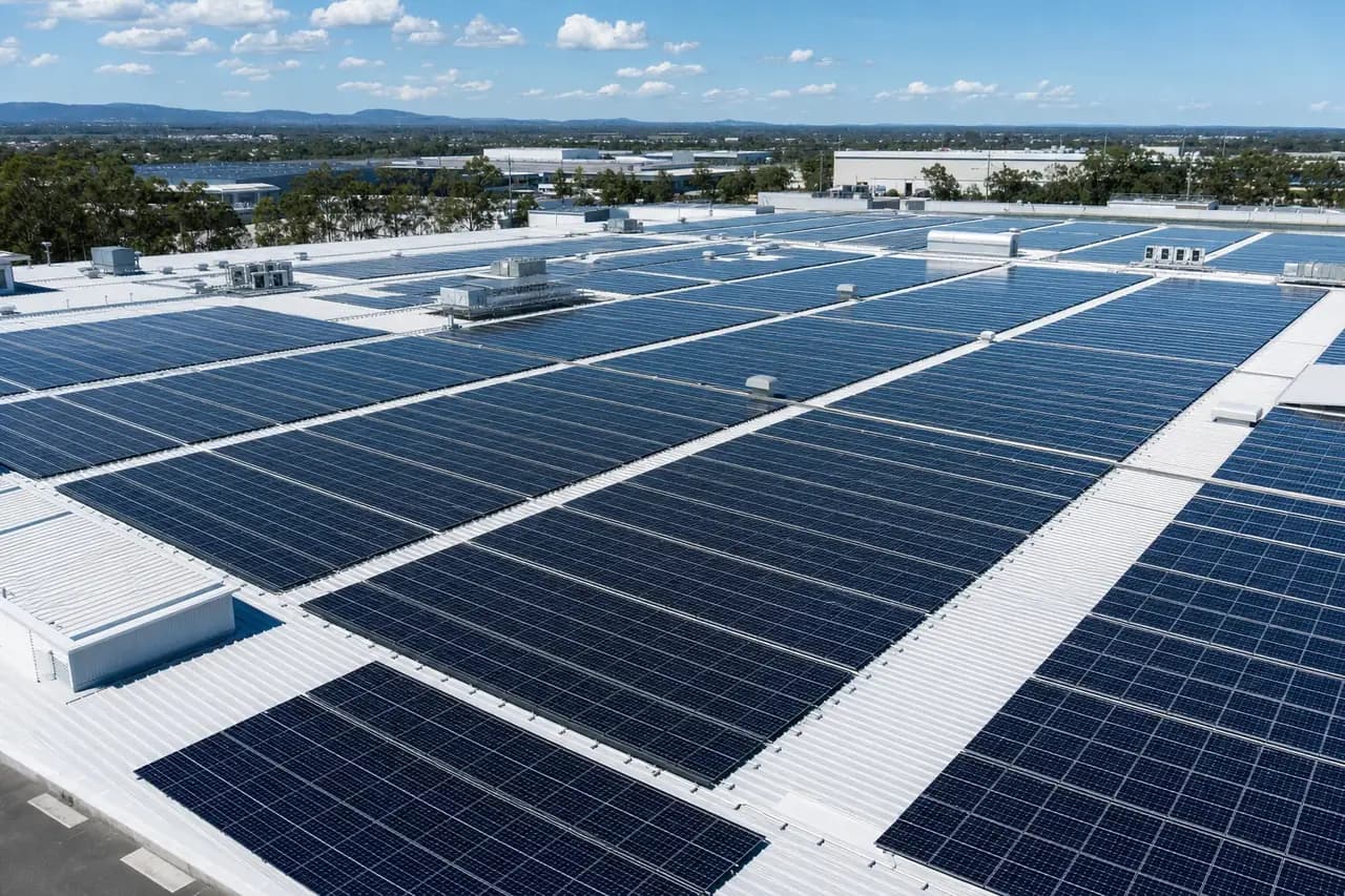Commercial solar array on a Gold Coast business rooftop generating daytime power