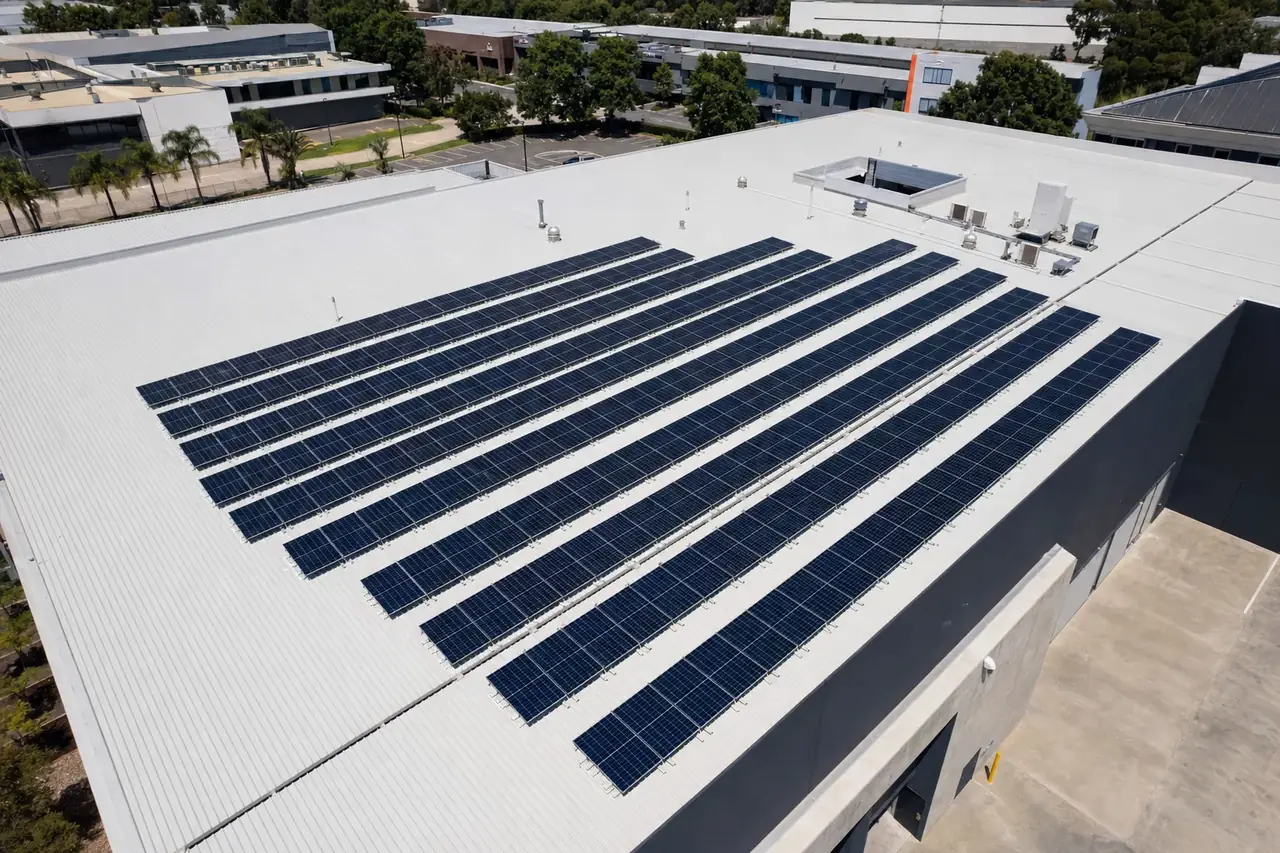 Rows of solar panels sized to match a Gold Coast commercial roof and daytime load